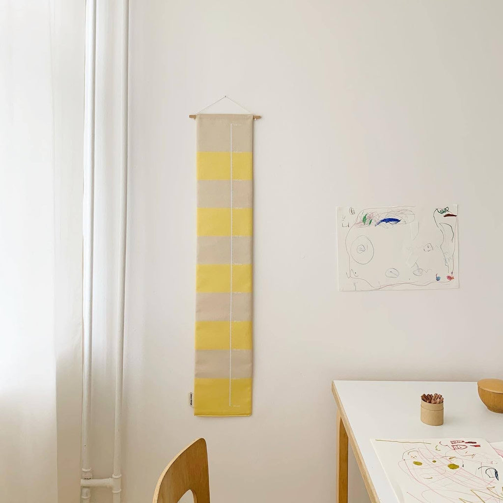 Yellow striped growth chart for children
