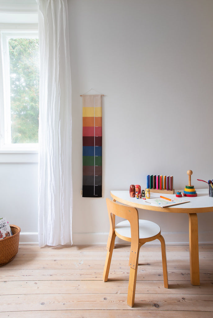 Colorful striped growth chart for children