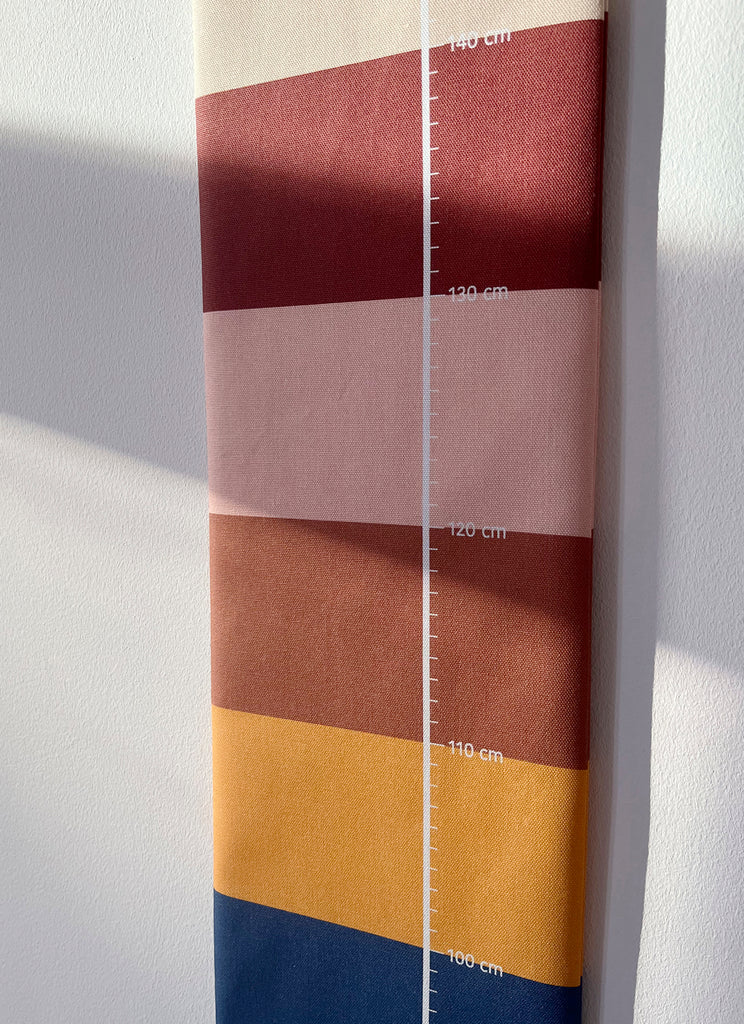 Colorful striped growth chart for children, details